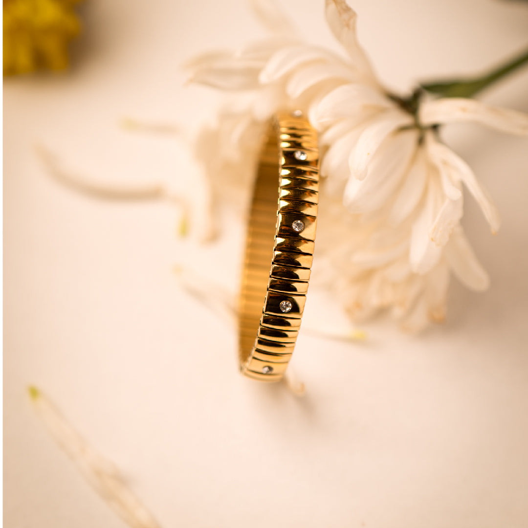 Gold with Zirconia Stretchable Bangle bracelet by Nashira, shown close up