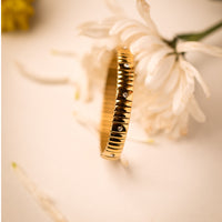 Gold with Zirconia Stretchable Bangle bracelet by Nashira, shown close up